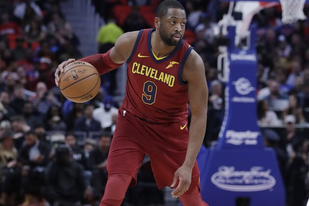 Cleveland Cavaliers guard Dwyane Wade controls the ball during the second half of an NBA basketball game against the Detroit Pistons, Monday, Nov. 20, 2017, in Detroit. (AP Photo/Carlos Osorio)