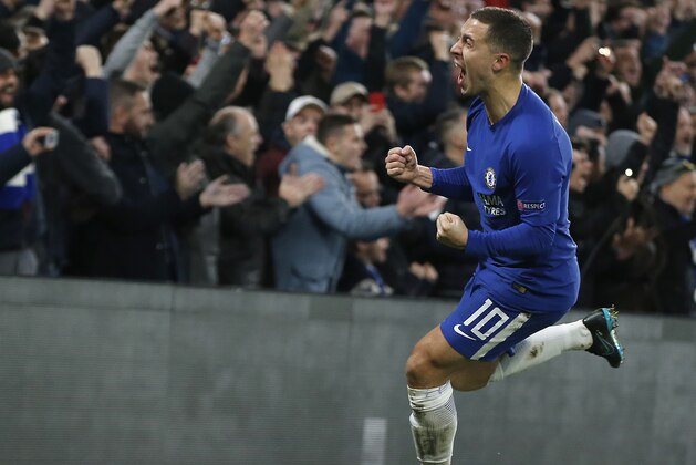 Chelsea's Eden Hazard celebrates after Atletico's Stefan Savic scored an own goal during the Champions League Group C soccer match between Chelsea and Atletico Madrid at Stamford Bridge stadium in London Tuesday, Dec. 5, 2017. (AP Photo/Alastair Grant)