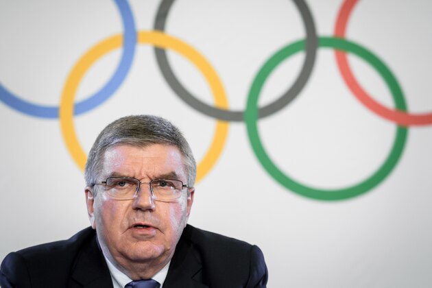 International Olympic Committee (IOC) President Thomas Bach attends a press conference following an executive meeting on Russian doping, on December 5, 2017 in Lausanne.
Russia were banned from the 2018 Olympics on December 5 over state-sponsored doping but the International Olympic Committee said Russian competitors would be able to compete 'under strict conditions'. / AFP PHOTO / Fabrice COFFRINI        (Photo credit should read FABRICE COFFRINI/AFP/Getty Images)