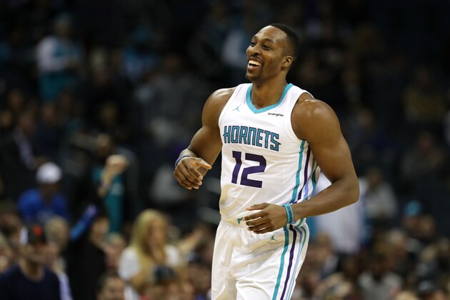 CHARLOTTE, NC - DECEMBER 04:  Dwight Howard #12 of the Charlotte Hornets reacts after a play against the Orlando Magic during their game at Spectrum Center on December 4, 2017 in Charlotte, North Carolina.  NOTE TO USER: User expressly acknowledges and agrees that, by downloading and or using this photograph, User is consenting to the terms and conditions of the Getty Images License Agreement.  (Photo by Streeter Lecka/Getty Images)