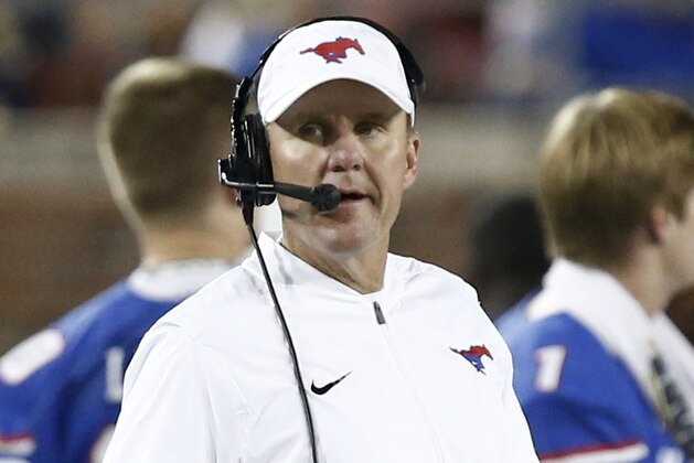 SMU head coach Chad Morris directs the Mustangs against Central Florida during the first half of an NCAA college football game, Saturday, Nov. 4, 2017, in Dallas. (AP Photo/Mike Stone)