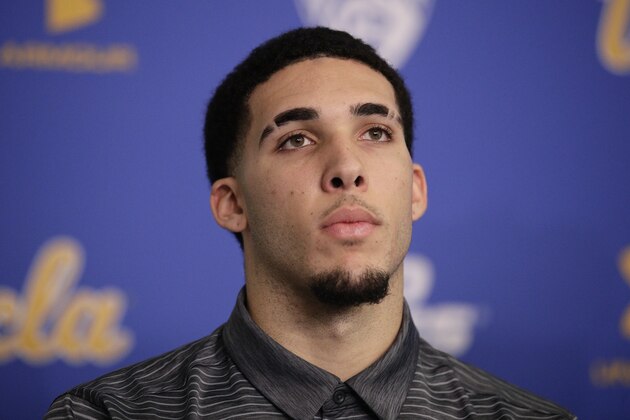 FILe -In this Wednesday, Nov. 15, 2017, file photo, UCLA NCAA college basketball player LiAngelo Ball attends a news conference at UCLA in Los Angeles. The father of UCLA guard LiAngelo Ball says he's withdrawing his son from school so he can prepare to play in the NBA. LaVar Ball says his