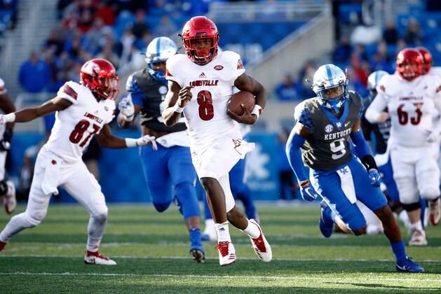 LEXINGTON, KY - NOVEMBER 25:  Lamar Jackson #8 of the Louisville Cardinals runs with the ball against the Kentucky Wildcats during the game at Commonwealth Stadium on November 25, 2017 in Lexington, Kentucky.  (Photo by Andy Lyons/Getty Images)