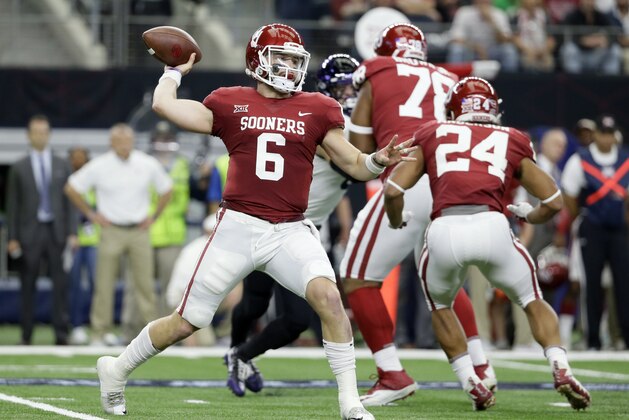 Oklahoma quarterback Baker Mayfield (6) throws a pass in the first half of the Big 12 Conference championship NCAA college football game against TCU on Saturday, Dec. 2, 2017, in Arlington, Texas. (AP Photo/Tony Gutierrez)
