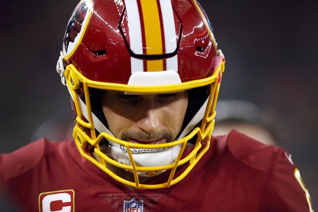 ARLINGTON, TX - NOVEMBER 30:  Kirk Cousins #8 of the Washington Redskins walks toward the sidelines during a game against the Dallas Cowboys at AT&T Stadium on November 30, 2017 in Arlington, Texas.  (Photo by Wesley Hitt/Getty Images)