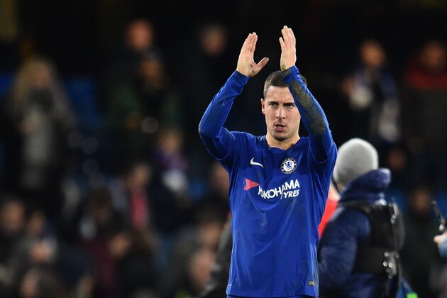 Chelsea's Belgian midfielder Eden Hazard applauds the crowd after a UEFA Champions League Group C football match between Chelsea and Atletico Madrid at Stamford Bridge in London on December 5, 2017. / AFP PHOTO / Glyn KIRK        (Photo credit should read GLYN KIRK/AFP/Getty Images)