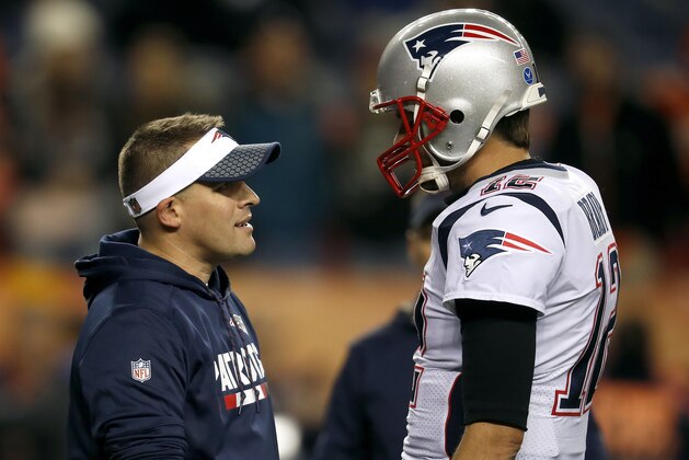 New England Patriots offensive coordinator Josh McDaniels talks with Tom Brady prior to an NFL football game against the Denver Broncos, Sunday, Nov. 12, 2017, in Denver. (AP Photo/David Zalubowski) New England Patriots offensive coordinator Josh McDaniels talks with Tom Brady prior to an NFL football game against the Denver Broncos, Sunday, Nov. 12, 2017, in Denver. (AP Photo/David Zalubowski)