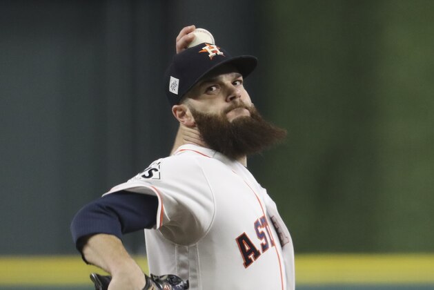 Houston Astros starting pitcher Dallas Keuchel throws during the first inning of Game 5 of baseball's World Series against the Los Angeles Dodgers Sunday, Oct. 29, 2017, in Houston. (AP Photo/Thomas B. Shea, Pool)
