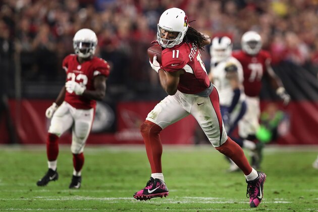 GLENDALE, AZ - DECEMBER 03:  Wide receiver Larry Fitzgerald #11 of the Arizona Cardinals runs with the football after a reception against the Los Angeles Rams during the NFL game at the University of Phoenix Stadium on December 3, 2017 in Glendale, Arizona. The Rams defeated the Cardinals 32-16.  (Photo by Christian Petersen/Getty Images)
