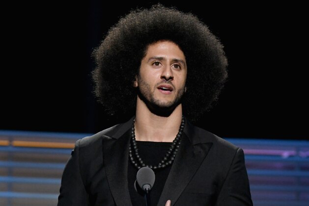 NEW YORK, NY - DECEMBER 05:  Colin Kaepernick receives the SI Muhammad Ali Legacy Award during SPORTS ILLUSTRATED 2017 Sportsperson of the Year Show on December 5, 2017 at Barclays Center in New York City.  Tune in to NBCSN on December 8 at 8 p.m. ET or Univision Deportes Network on December 9 at 8 p.m. ET to watch the one hour SPORTS ILLUSTRATED Sportsperson of the Year special.  (Photo by Slaven Vlasic/Getty Images for Sports Illustrated)