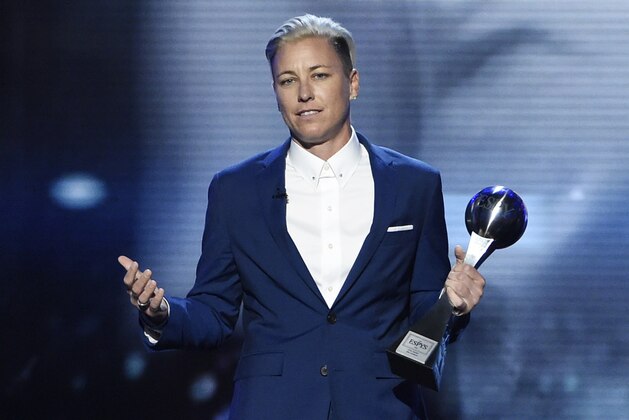 FILE - In this Wednesday, July 13, 2016, file photo, former soccer player Abby Wambach, accepts the icon award at the ESPY Awards at the Microsoft Theater in Los Angeles. Wambach is astonished when she reflects on her year. She went from publicly acknowledging a problem with alcohol and prescription pills to getting sober and marrying a