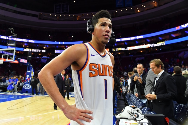 PHILADELPHIA, PA - DECEMBER 4: Devin Booker #1 of the Phoenix Suns talks with media after the gameagainst the Philadelphia 76ers on December 4, 2017 at Wells Fargo Center in Philadelphia, Pennsylvania. NOTE TO USER: User expressly acknowledges and agrees that, by downloading and or using this photograph, User is consenting to the terms and conditions of the Getty Images License Agreement. Mandatory Copyright Notice: Copyright 2017 NBAE (Photo by Jesse D. Garrabrant/NBAE via Getty Images)