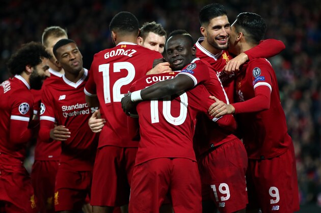LIVERPOOL, ENGLAND - DECEMBER 06:  Philippe Coutinho of Liverpool celebrates after scoring his sides fifth goal with his team mates during the UEFA Champions League group E match between Liverpool FC and Spartak Moskva at Anfield on December 6, 2017 in Liverpool, United Kingdom.  (Photo by Clive Brunskill/Getty Images)