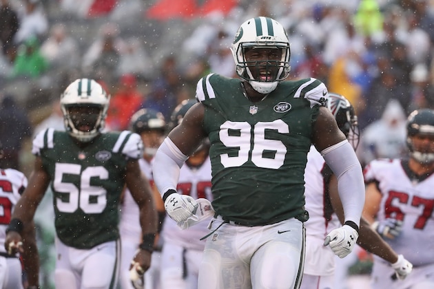 EAST RUTHERFORD, NJ - OCTOBER 29:  Defensive end Muhammad Wilkerson #96 of the New York Jets celebrates a tackle against running back Tevin Coleman #26 (not pictured) of the Atlanta Falcons during the third quarter of the game at MetLife Stadium on October 29, 2017 in East Rutherford, New Jersey.  (Photo by Al Bello/Getty Images)