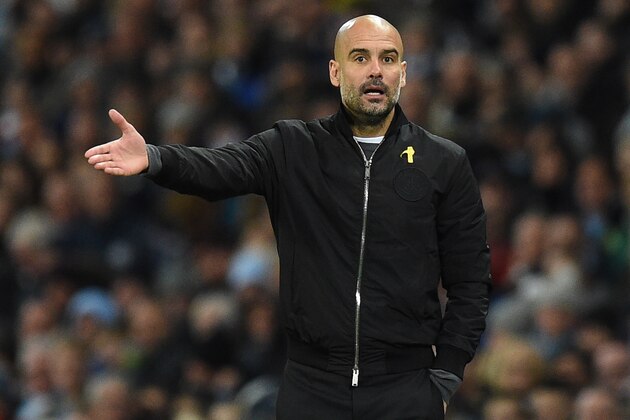Manchester City's Spanish manager Pep Guardiola gestures on the touchline during the English Premier League football match between Manchester City and West Ham United at the Etihad Stadium in Manchester, north west England, on December 3, 2017. / AFP PHOTO / Oli SCARFF / RESTRICTED TO EDITORIAL USE. No use with unauthorized audio, video, data, fixture lists, club/league logos or 'live' services. Online in-match use limited to 75 images, no video emulation. No use in betting, games or single club/league/player publications.  /         (Photo credit should read OLI SCARFF/AFP/Getty Images)
