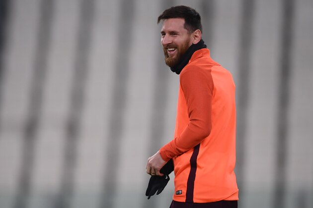 Barcelona's forward Lionel Messi from Argentina attends a training session on the eve of the UEFA Champions League football match Juventus Vs Barcelona on November 21, 2017 at the 'Juventus Stadium' in Turin.  / AFP PHOTO / MARCO BERTORELLO        (Photo credit should read MARCO BERTORELLO/AFP/Getty Images)