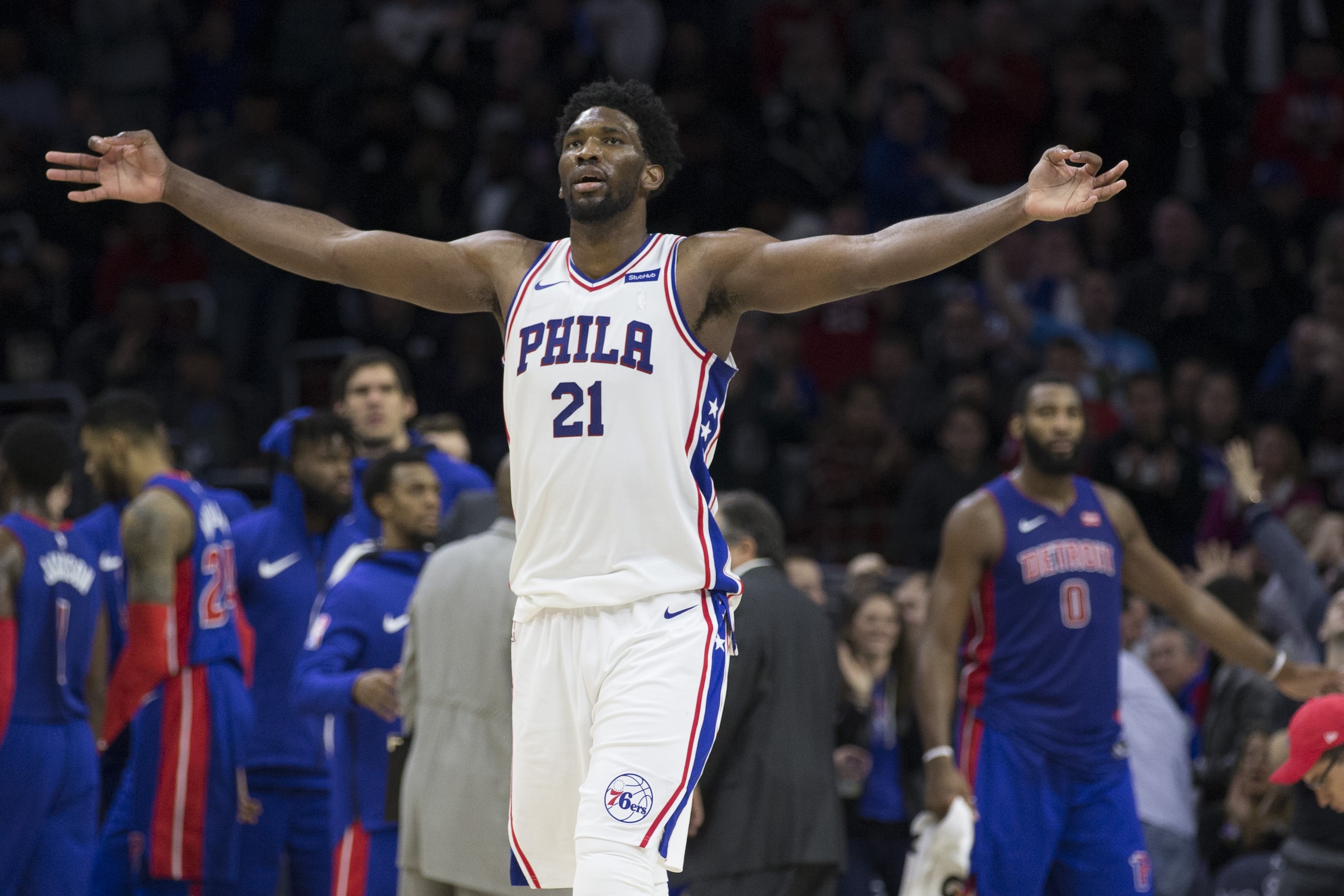 PHILADELPHIA, PA - DECEMBER 2: Joel Embiid #21 of the Philadelphia 76ers reacts in front of Andre Drummond #0 of the Detroit Pistons after a timeout in the fourth quarter at the Wells Fargo Center on December 2, 2017 in Philadelphia, Pennsylvania. The 76ers defeated the Pistons 108-103. NOTE TO USER: User expressly acknowledges and agrees that, by downloading and or using this photograph, User is consenting to the terms and conditions of the Getty Images License Agreement. (Photo by Mitchell Leff/Getty Images)