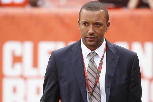 Cleveland Browns acting executive VP of football operations Sashi Brown walks the field during practice before an NFL preseason football game against the Chicago Bears, Thursday, Sept. 1, 2016, in Cleveland. (AP Photo/Ron Schwane)