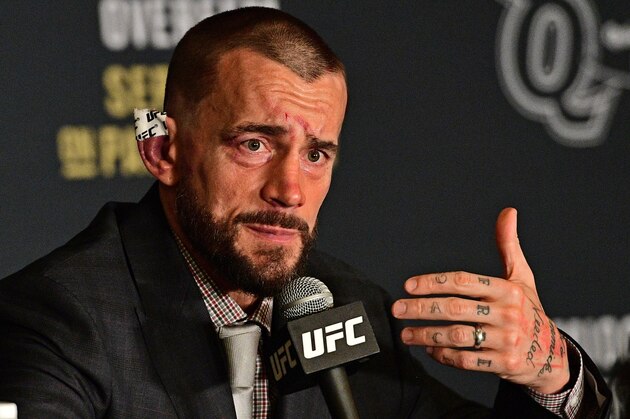 CM Punk speaks during the post fight press conference after his submission loss to Mickey Gall in a middleweight bout at UFC 203 on Saturday, Sept. 10, 2016, in Cleveland.  (AP Photo/David Dermer)