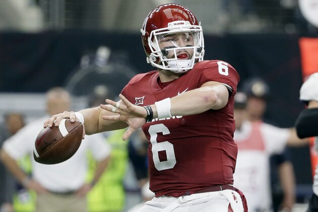 FILE - In this Dec. 2, 2017, file photo, Oklahoma quarterback Baker Mayfield (6) throws a pass in the first half of the Big 12 Conference championship NCAA college football game against TCU  in Arlington, Texas. Mayfield, reigning Heisman winner Lamar Jackson of Louisville and Stanford running back Bryce Love were chosen as finalists for the Heisman Trophy on Monday, Dec. 4, 2017. (AP Photo/Tony Gutierrez, File)