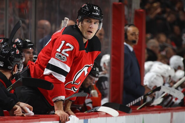 NEWARK, NJ - OCTOBER 28:  Ben Lovejoy #12 of the New Jersey Devils prepares to skate against the Arizona Coyotes at the Prudential Center on October 28, 2017 in Newark, New Jersey. The Devils defeated the Senators 5-4 in the shoot out.  (Photo by Bruce Bennett/Getty Images)