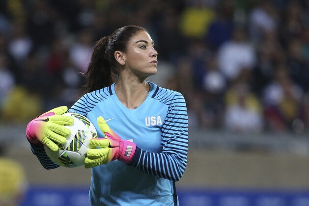 FILE - In this Aug. 3, 2016, file photo, United States' goalkeeper Hope Solo takes the ball during a women's soccer game at the Rio Olympics against New Zealand in Belo Horizonte, Brazil. Th suspended U.S. national team goalkeeper said Wednesday, Sept. 28, 2016, she has had shoulder replacement surgery. (AP Photo/Eugenio Savio, File)