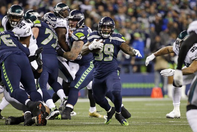 Seattle Seahawks' Mike Davis runs against the Philadelphia Eagles in the first half of an NFL football game, Sunday, Dec. 3, 2017, in Seattle. (AP Photo/Ted S. Warren)