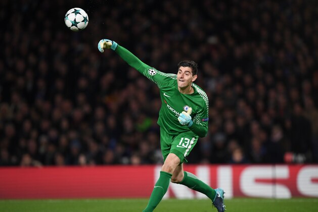 LONDON, ENGLAND - DECEMBER 05:  Thibaut Courtois of Chelesa throws the ball during the UEFA Champions League group C match between Chelsea FC and Atletico Madrid at Stamford Bridge on December 05, 2017 in London, United Kingdom. (Photo by Shaun Botterill/Getty Images)