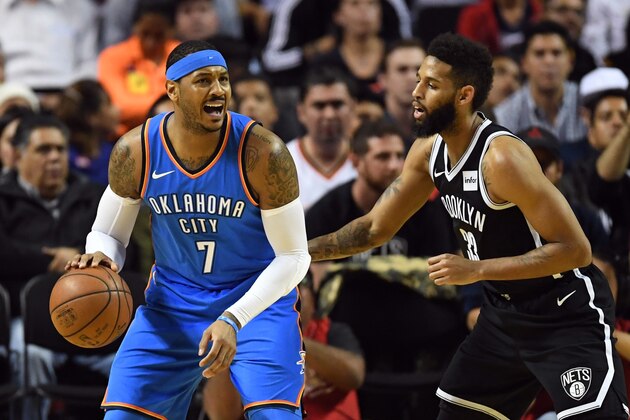 Oklahoma City Thunder Carmelo Anthony (L) vies for the ball with Brooklyn Nets Allen Crabbe during an NBA Global Games match at the Mexico City Arena, on December 7, 2017, in Mexico City. / AFP PHOTO / PEDRO PARDO        (Photo credit should read PEDRO PARDO/AFP/Getty Images)