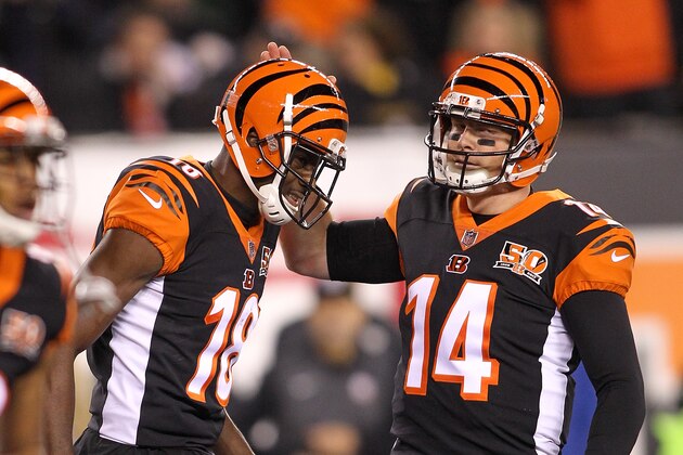 CINCINNATI, OH - DECEMBER 04:  Andy Dalton #14 of the Cincinnati Bengals celebrates with A.J. Green #18 after a touchdown against the Pittsburgh Steelers during the first half at Paul Brown Stadium on December 4, 2017 in Cincinnati, Ohio.  (Photo by John Grieshop/Getty Images)