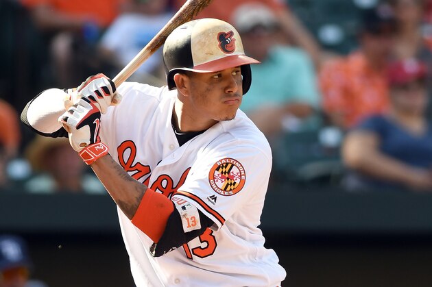 BALTIMORE, MD - SEPTEMBER 24:  Manny Machado #13 of the Baltimore Orioles bats against the Tampa Bay Rays at Oriole Park at Camden Yards on September 24, 2017 in Baltimore, Maryland.  (Photo by G Fiume/Getty Images)
