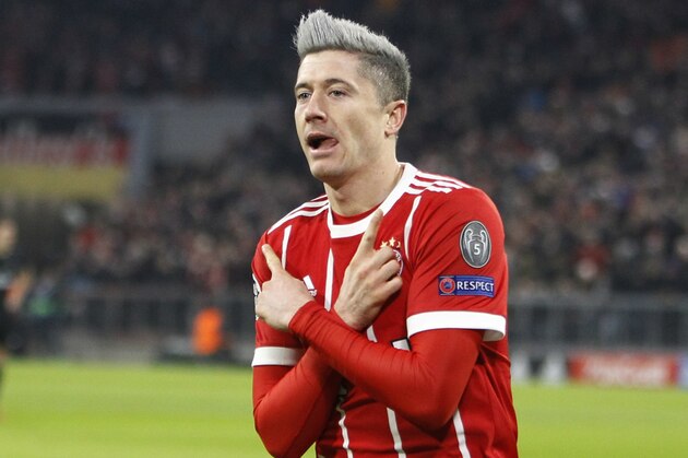 Bayern's Robert Lewandowski celebrates after scoring the opening goal during the Champions League Group B soccer match between FC Bayern Munich and Paris Saint-Germain, at Allianz Arena stadium in Munich, Germany, Tuesday, Dec. 5, 2017. (AP Photo/Thomas Schmidtutz) Bayern's Robert Lewandowski celebrates after scoring the opening goal during the Champions League Group B soccer match between FC Bayern Munich and Paris Saint-Germain, at Allianz Arena stadium in Munich, Germany, Tuesday, Dec. 5, 2017. (AP Photo/Thomas Schmidtutz)