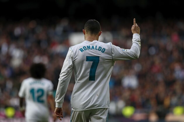 MADRID, SPAIN - DECEMBER 09: Cristiano Ronaldo of Real Madrid CF celebrates scoring their second goal during the La Liga match between Real Madrid CF and Sevilla FC at Estadio Santiago Bernabeu on December 9, 2017 in Madrid, Spain . (Photo by Gonzalo Arroyo Moreno/Getty Images)