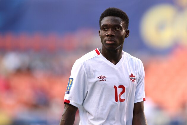 HOUSTON , TX - JULY 11:  Alphonso Davies of Canada looks on during the 2017 CONCACAF Gold Cup Group A match between Costa Rica and Canada at BBVA Compass Stadium on July 11, 2017 in Houston, Texas.  (Photo by Matthew Ashton - AMA/Getty Images)