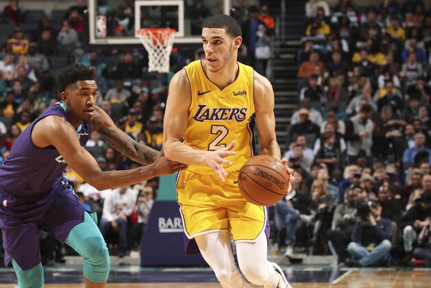 CHARLOTTE, NC - DECEMBER 9: Lonzo Ball #2 of the Los Angeles Lakers handles the ball against the Charlotte Hornets on December 9, 2017 at the Spectrum Center in Charlotte, North Carolina. NOTE TO USER: User expressly acknowledges and agrees that, by downloading and or using this photograph, User is consenting to the terms and conditions of the Getty Images License Agreement.  Mandatory Copyright Notice:  Copyright 2017 NBAE (Photo by Kent Smith/NBAE via Getty Images)
