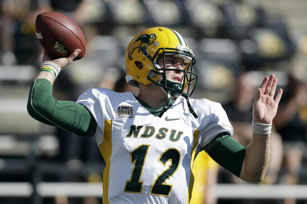 North Dakota State quarterback Easton Stick warms up before an NCAA college football game against Iowa, Saturday, Sept. 17, 2016, in Iowa City, Iowa. (AP Photo/Charlie Neibergall)
