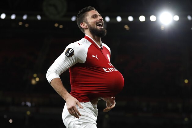 Arsenal's Olivier Giroud celebrates scoring his sides fifth goal during the Europa League Group H soccer match between Arsenal and BATE Borisov at Emirates stadium in London, Thursday, Dec. 7, 2017. (AP Photo/Kirsty Wigglesworth)