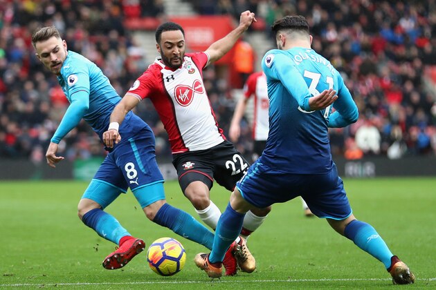 SOUTHAMPTON, ENGLAND - DECEMBER 10:  Aaron Ramsey and Sead Kolasinac of Arsenal battle for possession with Nathan Redmond of Southampton during the Premier League match between Southampton and Arsenal at St Mary's Stadium on December 9, 2017 in Southampton, England.  (Photo by Catherine Ivill/Getty Images)