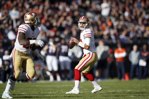 CHICAGO, IL - DECEMBER 03: Jimmy Garoppolo #10 of the San Francisco 49ers looks to pass against the Chicago Bears during a game at Soldier Field on December 3, 2017 in Chicago, Illinois. The 49ers won 15-14. (Photo by Joe Robbins/Getty Images)