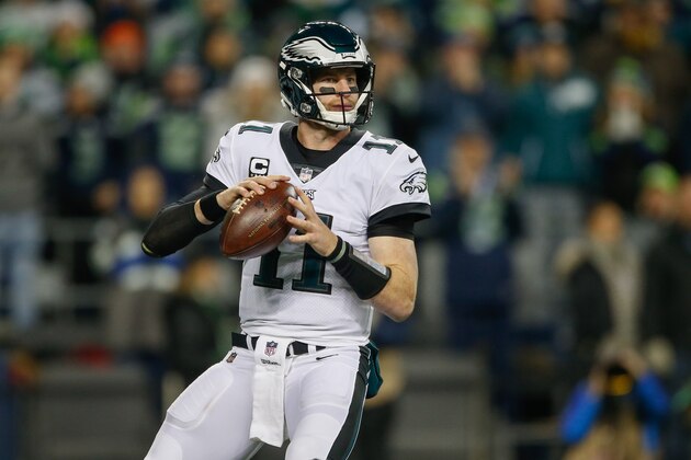 SEATTLE, WA - DECEMBER 03:  Quarterback Carson Wentz #11 of the Philadelphia Eagles drops back to pass against the Seattle Seahawks at CenturyLink Field on December 3, 2017 in Seattle, Washington.  (Photo by Otto Greule Jr/Getty Images)