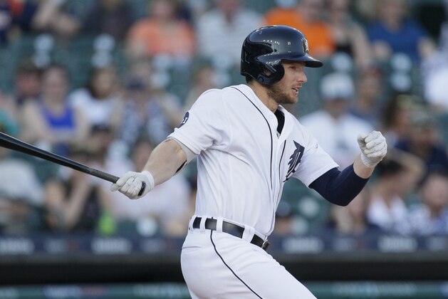 DETROIT, MI - SEPTEMBER 23:  Alex Presley #14 of the Detroit Tigers singles to drive in Ian Kinsler against the Minnesota Twins during the first inning at Comerica Park on September 23, 2017 in Detroit, Michigan. (Photo by Duane Burleson/Getty Images)