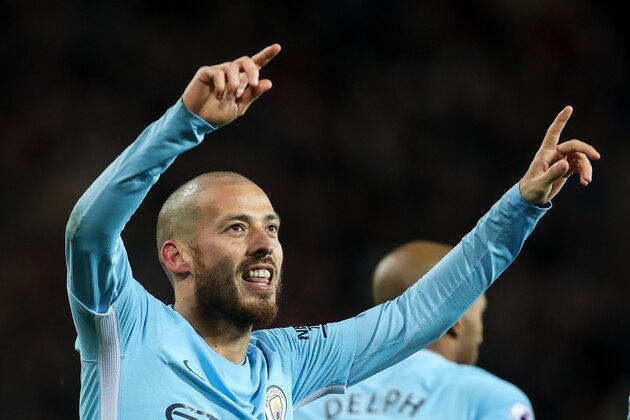 MANCHESTER, ENGLAND - DECEMBER 10: David Silva of Manchester City celebrates after scoring a goal to make it 0-1 during the Premier League match between Manchester United and Manchester City at Old Trafford on December 10, 2017 in Manchester, England. (Photo by Robbie Jay Barratt - AMA/Getty Images)