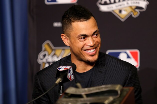 LOS ANGELES, CA - OCTOBER 25:  2017 Hank Aaron Award recipient Giancarlo Stanton #27 of the Miami Marlins attends the 2017 Hank Aaron Award press conference prior to game two of the 2017 World Series between the Houston Astros and the Los Angeles Dodgers at Dodger Stadium on October 25, 2017 in Los Angeles, California.  (Photo by Tim Bradbury/Getty Images)