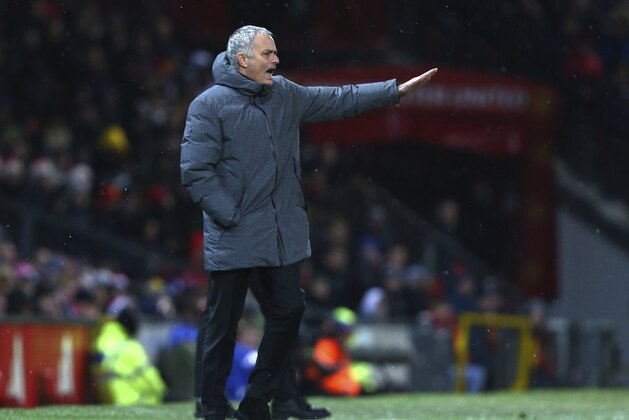 Manchester United coach Jose Mourinho gestures during the English Premier League soccer match between Manchester United and Manchester City at Old Trafford Stadium in Manchester, England, Sunday, Dec. 10, 2017. (AP Photo/Dave Thompson)