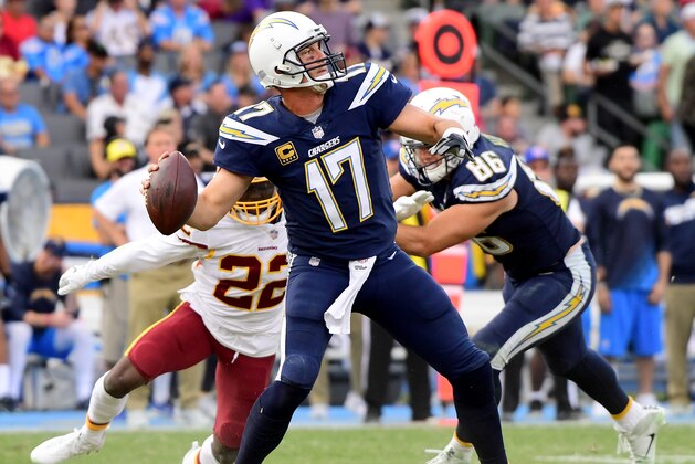 CARSON, CA - DECEMBER 10: Philip Rivers #17 of the Los Angeles Chargers throws a touchdown pass to Keenan Allen #13 during the third quarter in a 30-13 win over the Washington Redskins at StubHub Center on December 10, 2017 in Carson, California. (Photo by Harry How/Getty Images) CARSON, CA - DECEMBER 10: Philip Rivers #17 of the Los Angeles Chargers throws a touchdown pass to Keenan Allen #13 during the third quarter in a 30-13 win over the Washington Redskins at StubHub Center on December 10, 2017 in Carson, California. (Photo by Harry How/Getty Images)