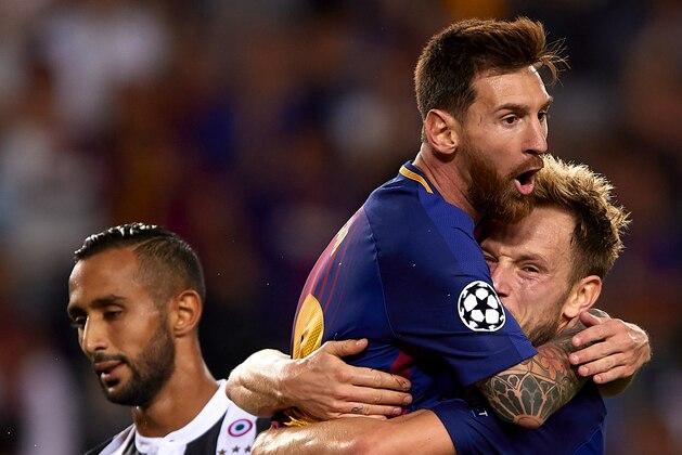 BARCELONA, SPAIN - SEPTEMBER 12:  Ivan Rakitic (R) of Barcelona celebrates scoring his team's second goal with his teammate Lionel Messi during the UEFA Champions League group D match between FC Barcelona and Juventus at Camp Nou on September 12, 2017 in Barcelona, Spain.  (Photo by Manuel Queimadelos Alonso/Getty Images)