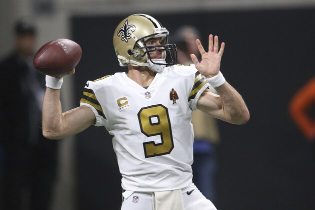 New Orleans Saints quarterback Drew Brees (9) works against the Atlanta Falcons during the second half of an NFL football game, Thursday, Dec. 7, 2017, in Atlanta. (AP Photo/John Bazemore)