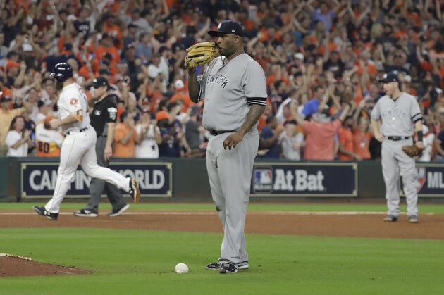 New York Yankees starting pitcher CC Sabathia reacts after giving up a home run to Houston Astros' Evan Gattis during the fourth inning of Game 7 of baseball's American League Championship Series Saturday, Oct. 21, 2017, in Houston. (AP Photo/David J. Phillip)