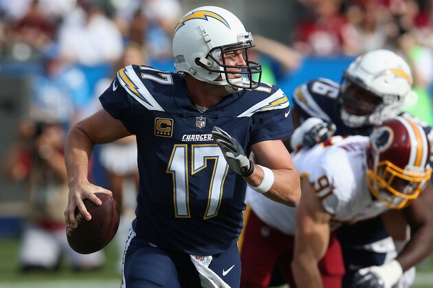 CARSON, CA - DECEMBER 10:  Quarterback Philip Rivers #17 of the Los Angeles Chargers rolls out with the ball in the first quarter against the Washington Redskins on December 10, 2017 at StubHub Center in Carson, California.  (Photo by Stephen Dunn/Getty Images)