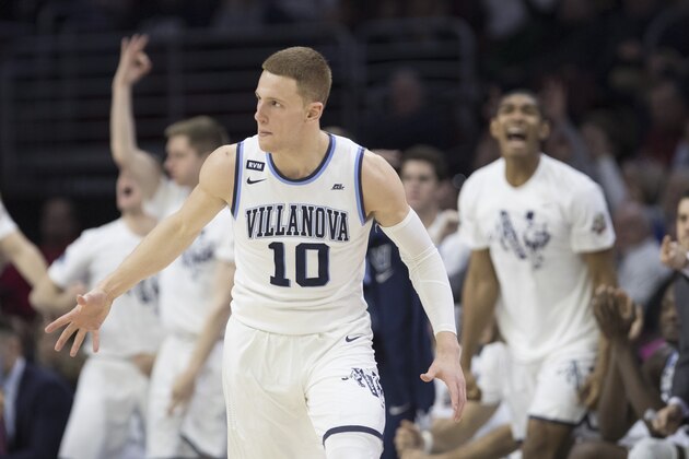PHILADELPHIA, PA - DECEMBER 10: Donte DiVincenzo #10 of the Villanova Wildcats reacts after a made three point basket along with the bench in the second half against the La Salle Explorers at the Wells Fargo Center on December 10, 2017 in Philadelphia, Pennsylvania. The Wildcats defeated the Explorers 77-68. (Photo by Mitchell Leff/Getty Images)
